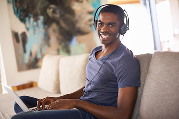 Image showing Man, portrait or radio with laptop on sofa for internet streaming, happiness or online research with music. Student, black person or technology with headphones for relax, studying or learning in home