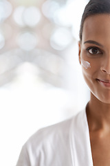 Image showing Portrait, skincare and closeup of woman with lotion for dermatology, wellness or beauty in morning. Smile, moisturizer and face of person for cosmetics facial treatment and healthy skin in house.