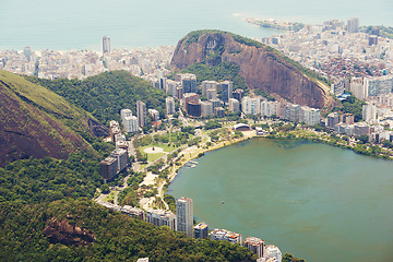 Image showing Coastline, nature or drone with ocean, city or environment with waves or getaway trip with holiday. Seaside, earth or clouds with water or vacation with landscape or buildings with aerial view or sky