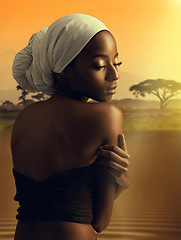 Image showing Beauty, culture and self care with black woman in Africa at sunset with turban for cosmetics or wellness. Skincare, heritage and tradition with natural young model outdoor in nature for dermatology