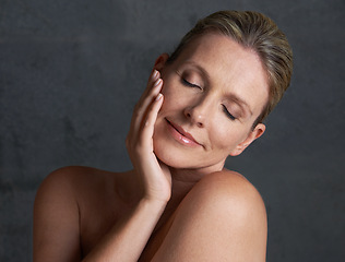 Image showing Happy mature woman, studio and beauty, skin care and natural look in self love moment of thought. Old caucasian female person, face and dreaming in grey background, bodycare and naked confidence