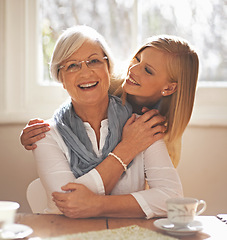 Image showing Grandmother, grandchild and happiness for bonding in portrait at nursing home with tea and conversation with love. Grandma, woman and together with affection or care, family and embrace with hug