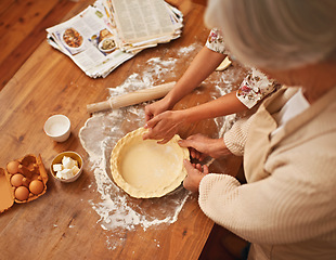 Image showing Hands, baking and senior with recipes in kitchen for dessert and cookies with flour for cake. Grandma, retirement and eggs with butter for startup business as entrepreneur in house for food