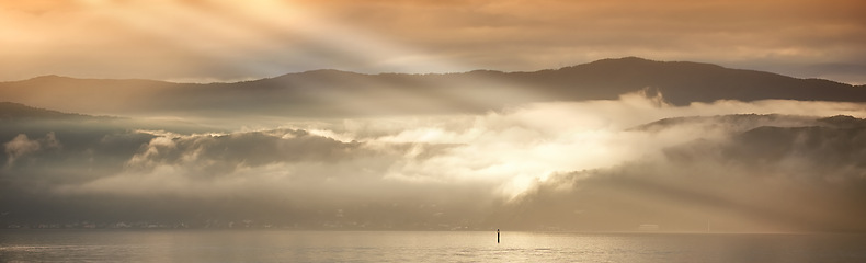 Image showing Beach, sunset and sunrise with clouds, view and drone for aesthetic and travel environment and sea. Banner sky, ocean and landscape in Miami, trip and vacation for nature and sunlight tranquility