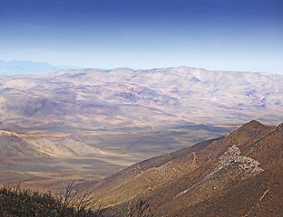 Image showing Mountain, valley and natural landscape with blue sky, terrain and scenic view for travel destination. Earth, nature and environment for countryside, outdoor adventure or explore in California.