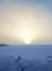 Image showing Landscape, snow and winter with sun for morning, weather and environment in an empty land or field. Landscape with ice, cold and horizon of sunrise or sunset with sky mockup for travel and outdoor