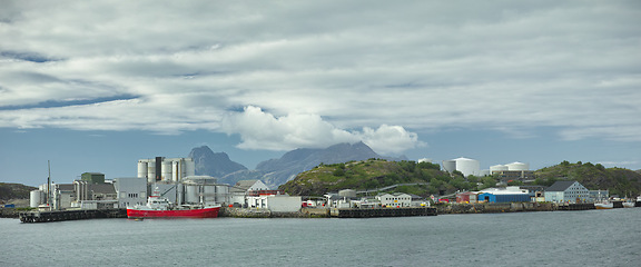 Image showing Fishing, plant and industrial tank on water for processing, production and feed mill for fish industry in Norway. Manufacturing, containers and warehouse for agriculture and sea factory with harbour