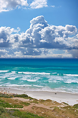 Image showing Blue sky, ocean and clouds with coastline horizon for peace, nature and environment with skyline seascape of tropical beach. Calm water, sea and earth with location for break or vacation with view