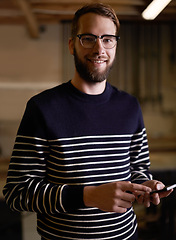 Image showing Man, portrait and glasses with phone for communication, social media or networking at home. Happy geek, confident and handsome male person with smile on mobile smartphone for online chatting or app