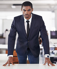 Image showing Portrait, businessman and confident in office on mission and assertive in corporate career in workplace. Serious face, black person or entrepreneur with ambition or satisfaction in startup company