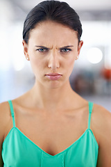 Image showing Portrait, frown and angry with woman, stress and emotions with expression and frustrated. Face, person and girl with reaction and defensive body language with bad news or rage with feedback and emoji