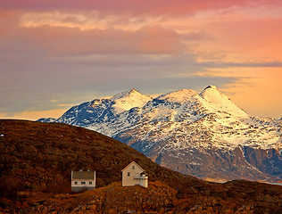 Image showing Landscape, mountain and snow with house in winter on cold weather and freezing with nature in Austria. Environment, outdoor and scenery for adventure or hiking on hill for tourist destination.