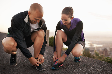 Image showing Fitness, shoes and couple in a road for running, training or morning cardio run in nature together. Sneakers, shoelace and sports runner people outdoor for marathon, routine or performance workout