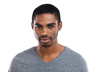 Image showing Portrait, confident and serious with young black man in studio isolated on white background. Face, assertive or tough and person in tshirt feeling cool, proud or strong with determined expression