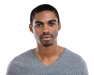 Image showing Portrait, assertive and serious with young black man in studio isolated on white background. Face, confident or tough and person in tshirt feeling cool, proud or strong with determined expression