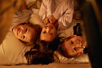 Image showing Children, love and portrait of siblings in a bed with fun, support and trust while bonding at home together. Family, night and face of kids in a bedroom for evening games, playing or indoor camping