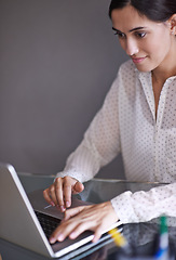 Image showing Woman, laptop and creative for blog, website and online career with technology. Blogger, tech and startup with browsing, writing and web for connectivity and happiness with entrepreneur and internet