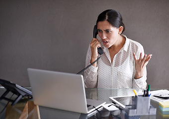 Image showing Upset, woman and phone call in home office for conversation on work, frustrated and speaking on business for networking. Person, annoyed and discussion on startup company with laptop for research