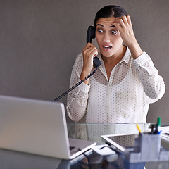 Image showing Confused, woman and phone call in office for conversation on work, communication and uncertain for small business. Female person, talking and discussion on startup company with laptop for research.