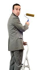 Image showing Businessman With Roller Brush