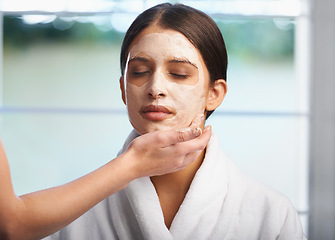 Image showing Hand, skincare and women at home with face mask or diy spa treatment at home together. Beauty, wellness and friends with facial product for skin, cleaning or bonding on weekend sleepover in a house