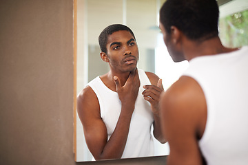 Image showing Bathroom, face and black man grooming for skincare or self care with treatment for guy. African male person, morning and healthcare with dermatology for results of soft, shine and glow in mirror