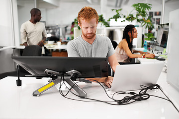 Image showing Man, computer or graphic designer with laptop for technology or future of media project in office. Person typing, online or desktop monitor on creative software for startup, creativity or business