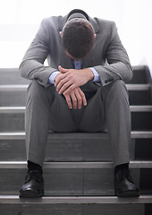 Image showing Businessman, failure or job loss in company or sad, rejection or thinking of career crisis. Salesman, sad and mental health on staircase for fired, worry and depression for termination of contract