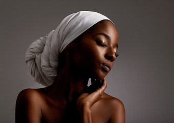 Image showing Beauty, cosmetics and black woman in dark studio with head scarf, skincare and pride in culture. Relax, skin glow and face of African model with dermatology, turban and girl on grey background