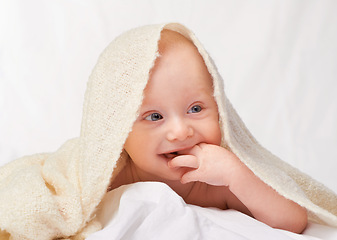 Image showing Baby, suck and finger for relax, comfort or sleep in nursery in studio on white background. Happy, young child and hand on blanket for peaceful nap time for health, rest and childhood development