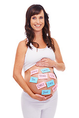Image showing Portrait, names and sticky notes on stomach of pregnant woman with baby in studio isolated on white background. Smile, choice or decision and happy prenatal mother with idea on belly for maternity