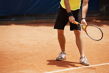 Image showing Tennis, sports and male player on court, outdoor turf and exercise for cardio fitness or fun. Racket, ball and athletic man with mockup space, training and practice for performance or competition