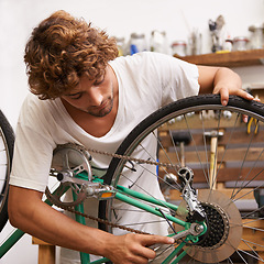 Image showing Handyman, fixing and bicycles with with tools at workshop for repair, maintenance with small business. Mechanic, Entrepreneur and garage as expert for bike with equipment for service and upgrade