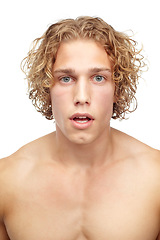 Image showing Man, portrait and closeup for hair care, treatment and styling isolated in studio. Male person, model or face with shock, wow or surprise on white background for growth, shampoo or blonde hairstyle