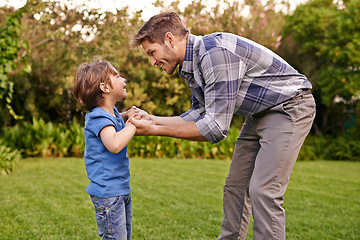 Image showing Father, son and holding hands in park with smile, together and happiness in nature for quality time. Summer, parent and child outdoor to relax in sunshine, fun and play in garden with love as family