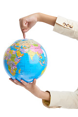 Image showing Business person, hands or spinning a globe in studio mockup, trade routes or world map for global networking. Corporate professional, worldwide industry and international commerce by white background