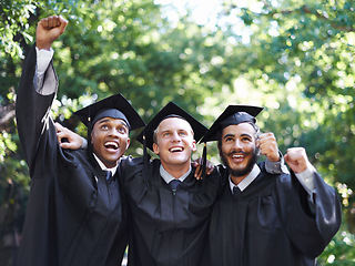 Image showing Happy, students and portrait at graduation with success, celebration and graduate outdoor with a smile. Fist pump, men and win at education event on campus with diversity and college achievement