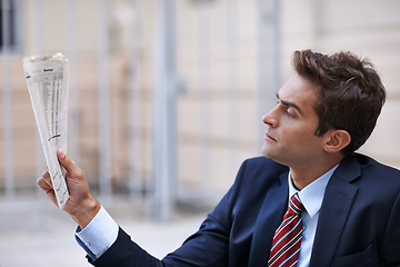 Image showing Employee, reading and newspaper for finance of corporate company for news of career. Man, thoughtful and worker of business and professional for accounting job in suit outdoor in city of New York