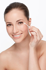 Image showing Woman, face and beauty with cotton swab for hygiene and skincare wellness, dermatology and self care on white background. Portrait, earbud and clean skin for glow and natural cosmetics in studio