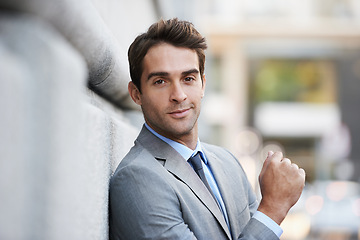 Image showing Happy, confident and portrait of businessman in city with positive, good and proud attitude. Smile, suit and handsome professional male accountant with classy and elegant style in urban town.