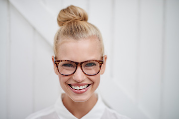 Image showing Smile, glasses and student with portrait of woman on wall background for fashion, youth and casual. Happiness, care and style with young female person in outdoors for education, nerd and face