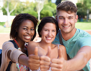 Image showing Students, group and thumbs up with diversity in portrait for education at university for learning. Friends, man and women for sign, vote or emoji for agreement, yes or smile for solidarity at college