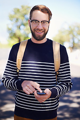 Image showing Portrait, phone and man in outdoors for education, student and scrolling on university app or internet. College campus, male person and typing a message or check email, online and communication