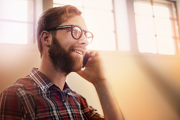 Image showing Young man, phone call and vision with glasses in discussion, communication or networking at home. Happy male person or freelancer with smile on mobile smartphone for friendly conversation at house