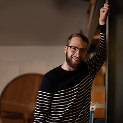 Image showing Man, portrait and confident in home to relax, smile and pride for comfort or enjoyment in living room. Male person, glasses and happy with eyewear for wellness, satisfaction and face in apartment