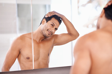 Image showing Bathroom, mirror and happy man with hair check, in a house for skincare, wellness or morning routine. Hairline, reflection and male person with growth, texture or satisfaction after shower at home