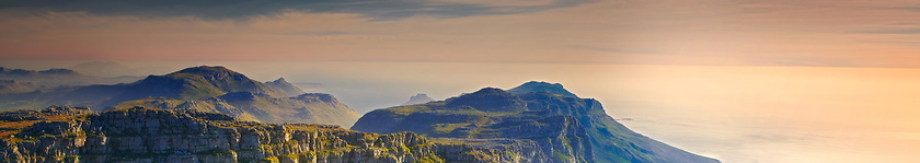 Image showing Mountain, landscape and banner of sky with clouds in heaven or countryside in Africa at sunset. Morning, outdoor and hill on horizon with aerial view of bush, nature or peak of environment with stone