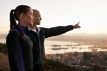 Image showing Exercise, nature and couple with hand pointing to sunset, city view or fitness vision. Health, training and sports people outside planning running route, workout or speed target together at sunrise