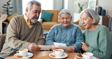 Image showing Coffee, reading and senior friends in living room of nursing home with letter or invitation. Smile, conversation and group of elderly people in retirement drinking cappuccino in lounge at house.