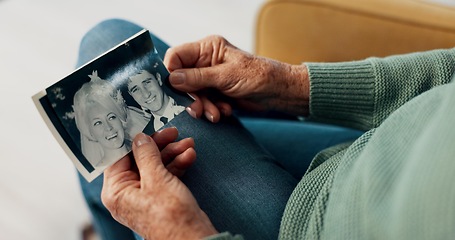 Image showing Hands, photograph and elderly person in retirement with memory, relax with history for nostalgia and think about life. Remember, past and old age with pension, retro picture and rest in lounge